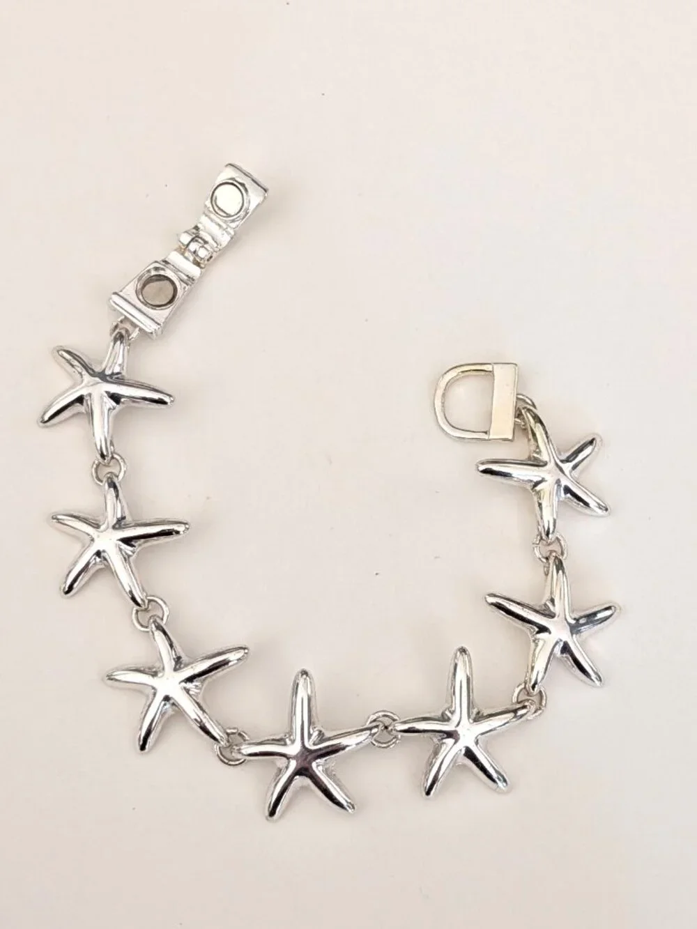 Silver starfish magnetic closure bracelet